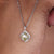 Cushion cut pendant with brilliant clarity and eye-catching elegance.