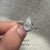 Avideri engagement ring featuring a bezel setting design.