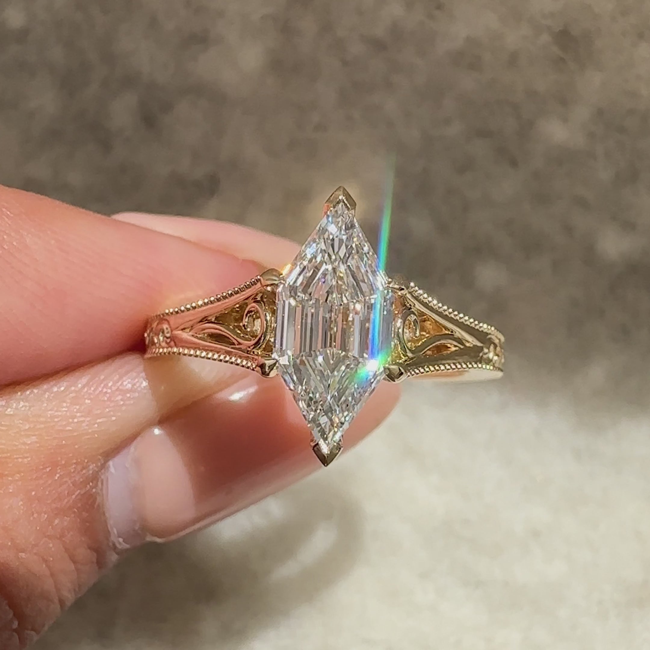 Vintage hexagon diamond ring with engraved band.
