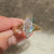 Vintage hexagon diamond ring with engraved band.
