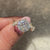 Handmade nature inspired diamond ring featuring Portuguese cut center stone
