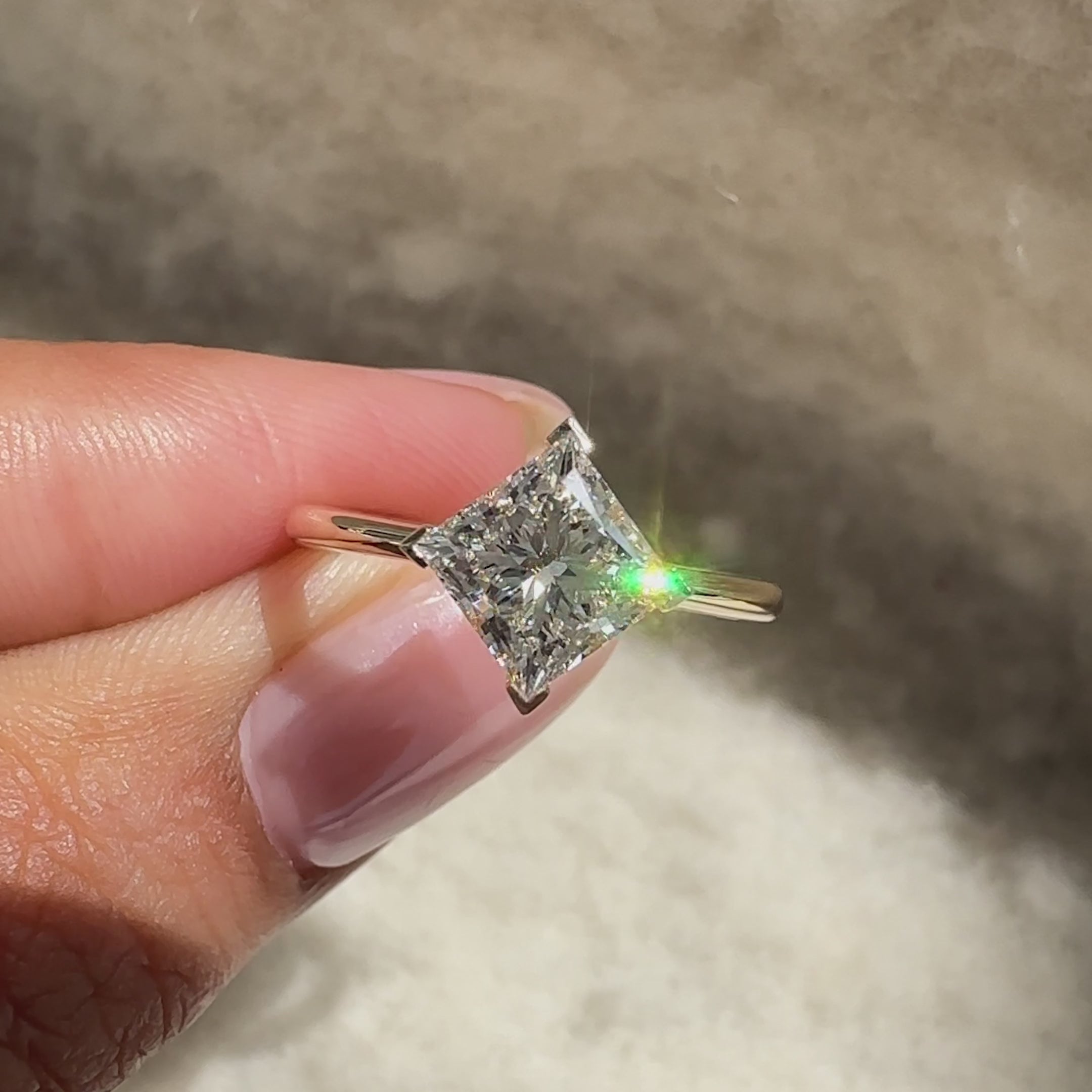 Lab grown princess ring with v prong setting.
