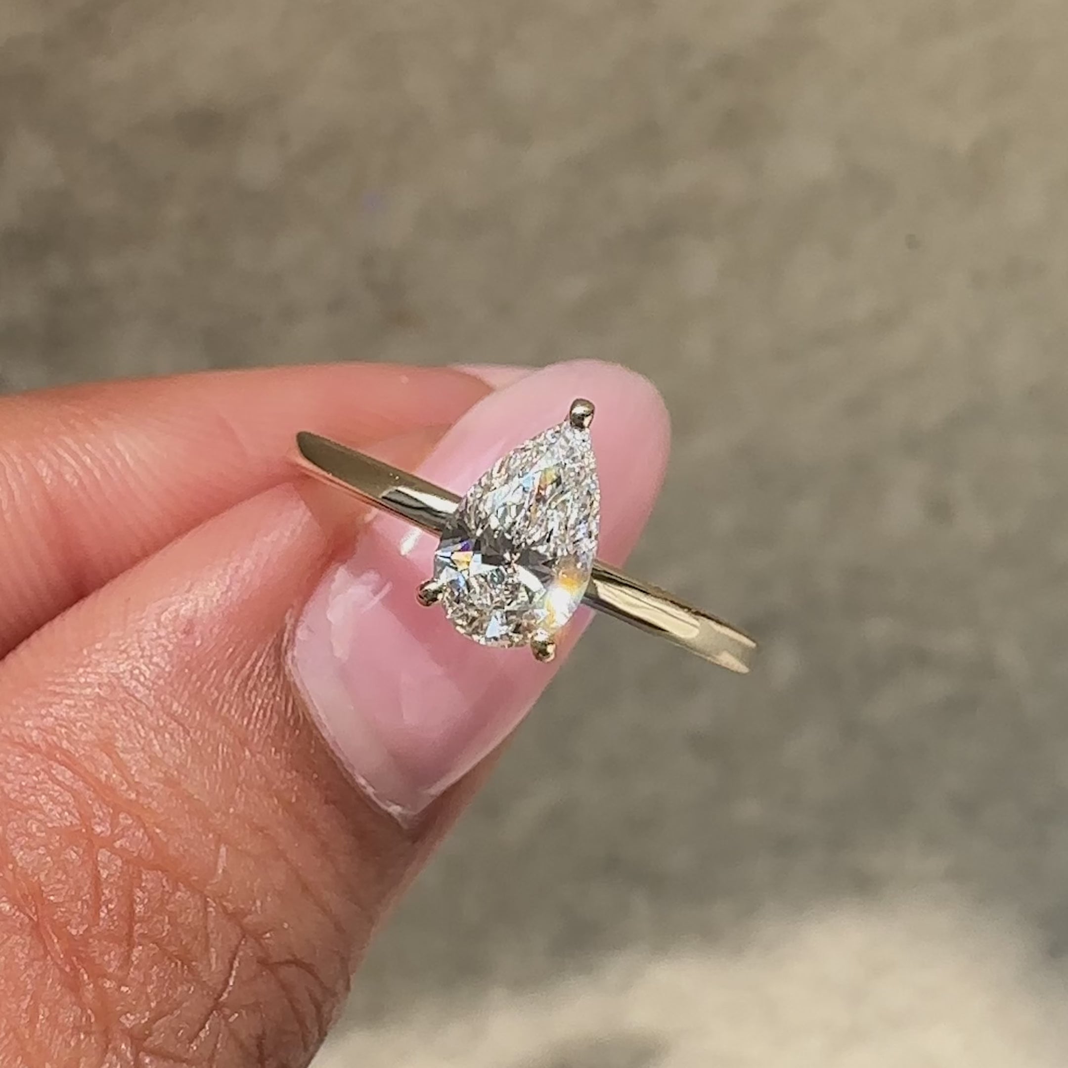 Handmade lab grown pear cut diamond ring.
