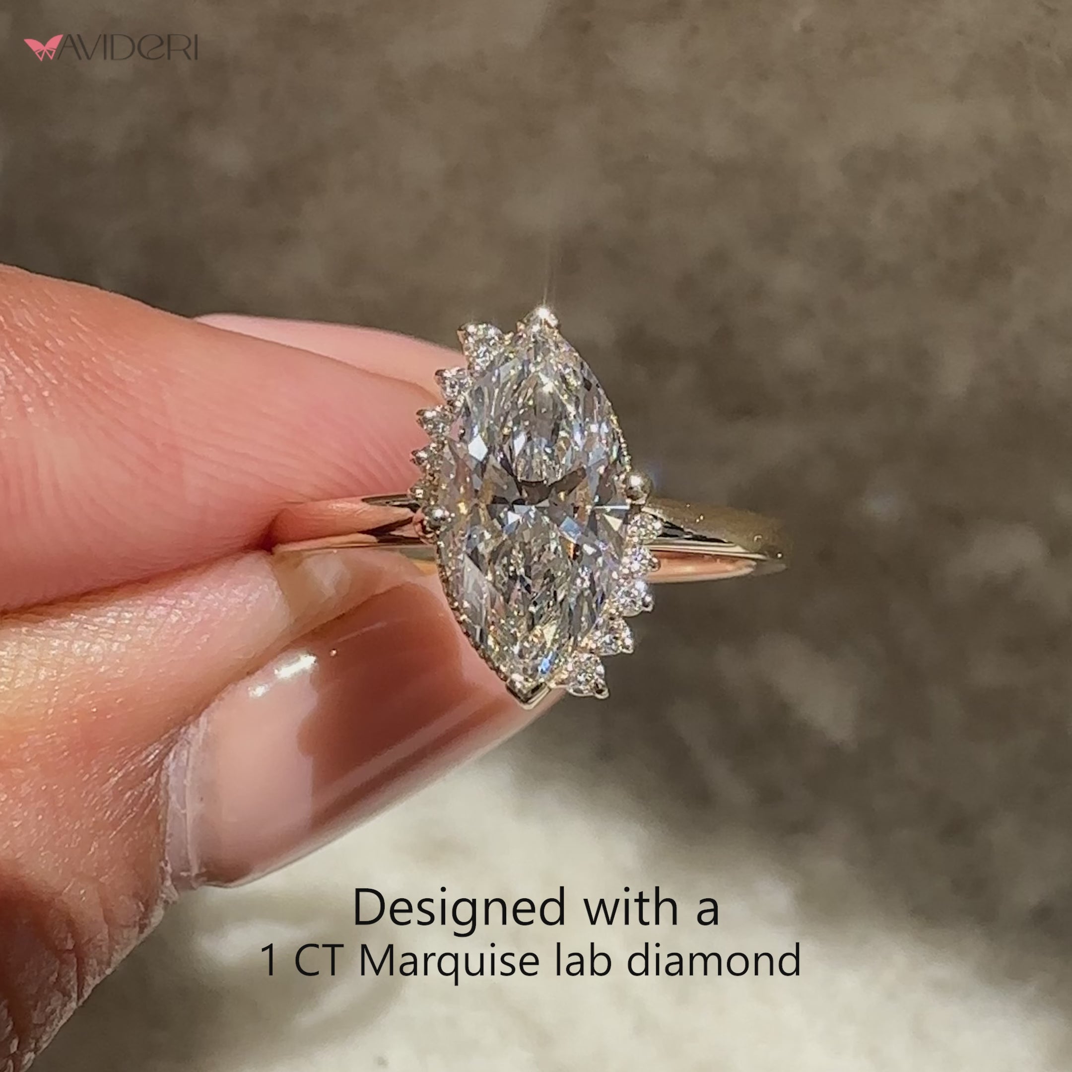 Marquise diamond ring with round stone cluster.