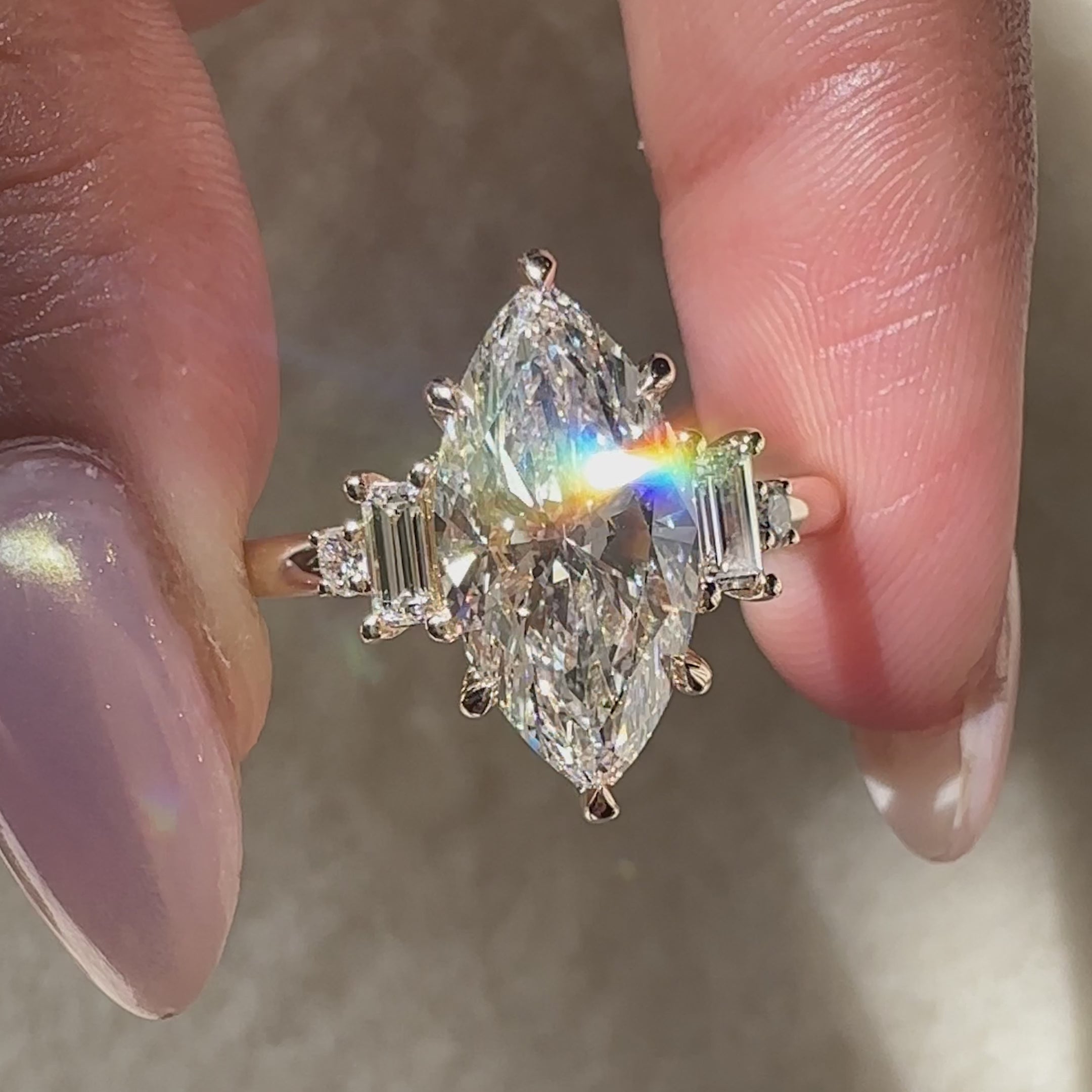 Yellow gold ring crafted with handmade detail and a five diamond design.
