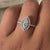 Marquise diamond with halo set in a pave band engagement ring, showcasing unmatched sparkle and sophistication.
