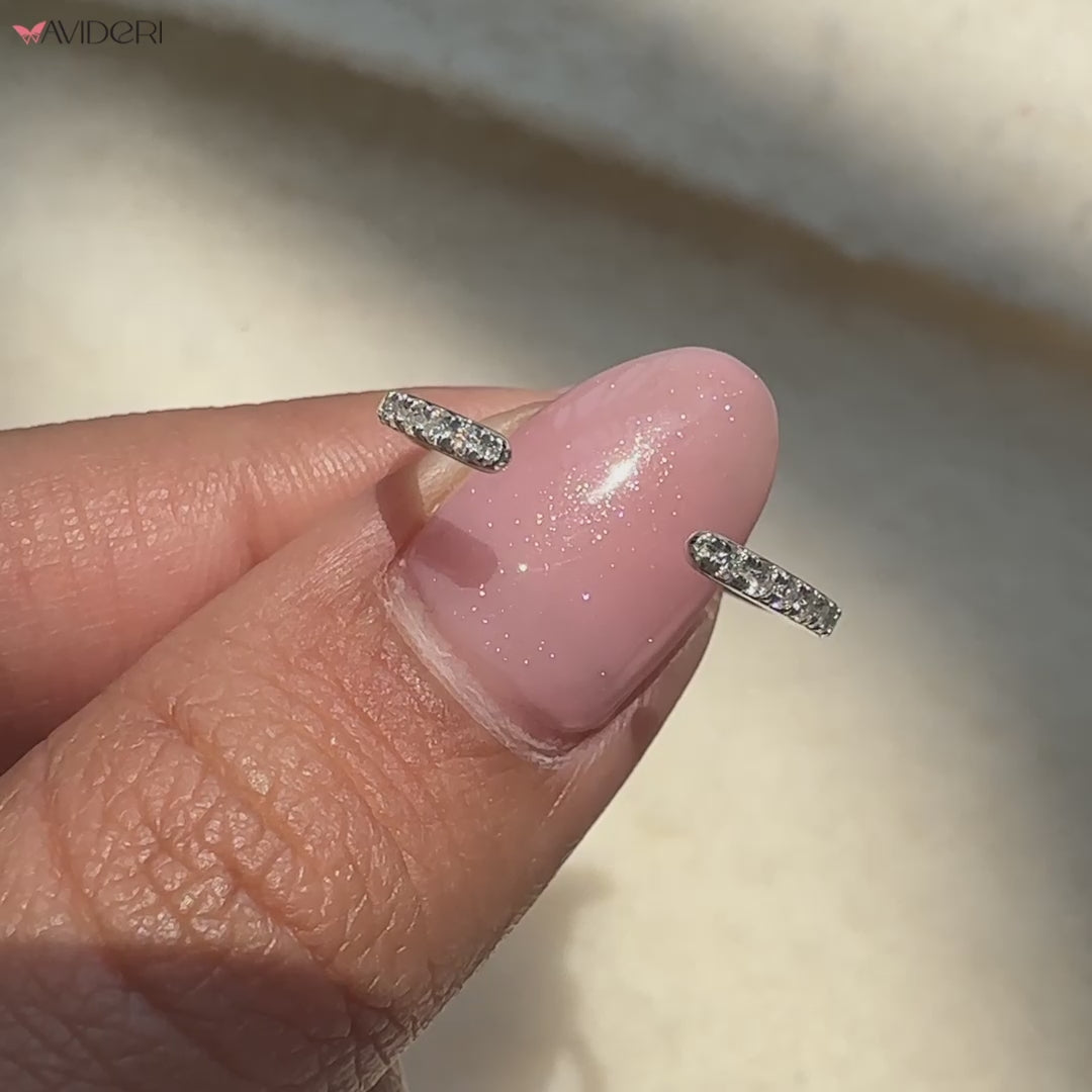 Unique open gap wedding band design.
