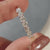 Avideri wedding band with diamond wedding band.