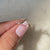 Handmade curved diamond band with four stones.