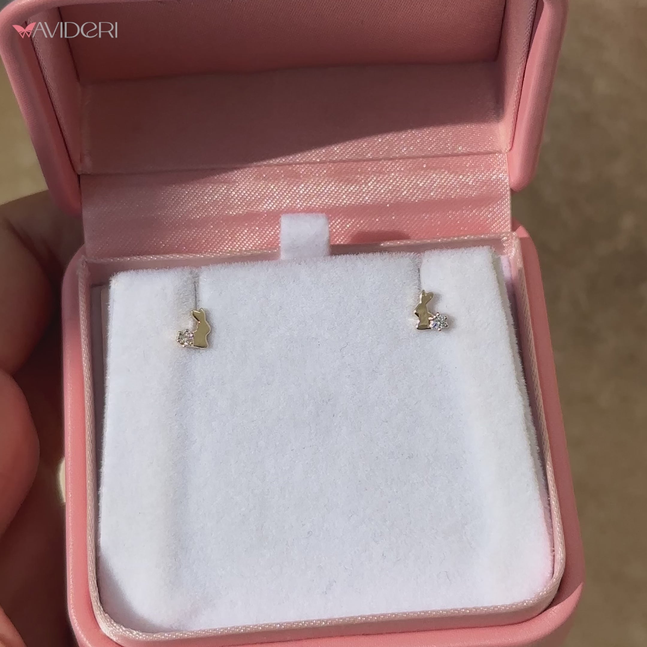 Lab grown diamond stud earrings in a simple style.