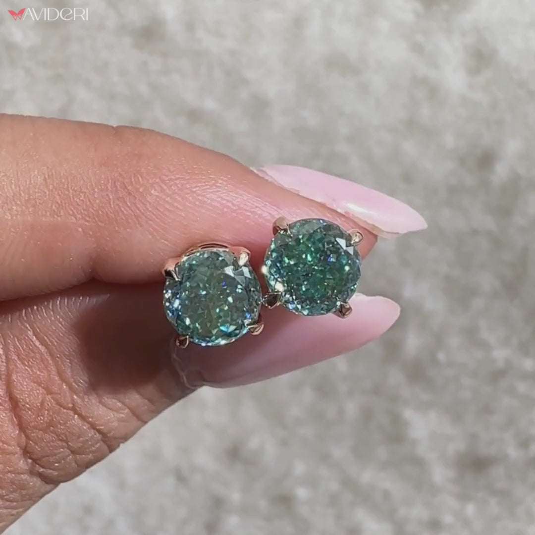 Avideri earrings in rose gold moissanite earrings.