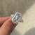 IGI certified lab grown emerald cut diamond ring.
