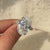 Oval lab grown diamond ring with double row pave band design.
