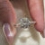 Rose gold engagement ring featuring round cut diamond engagement ring and open gallery ring.
