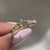 Semi eternity diamond band with art deco inspired design
