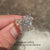 Marquise cut moissanite ring with vintage halo style.