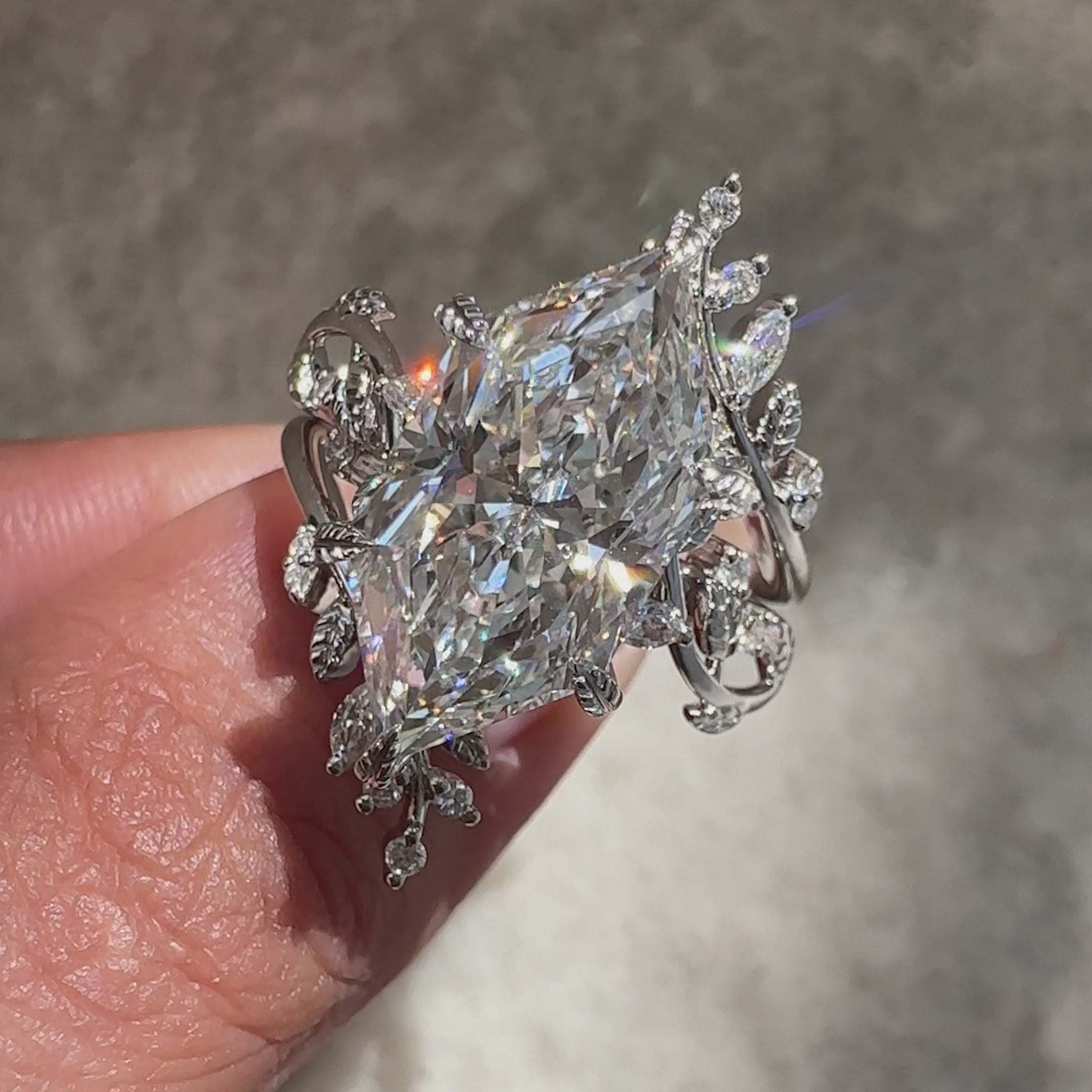 IGI certified marquise ring with enhancer band.