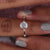 White gold cushion cut engagement ring with a cushion diamond and claw prongs for a timeless and sophisticated look.
