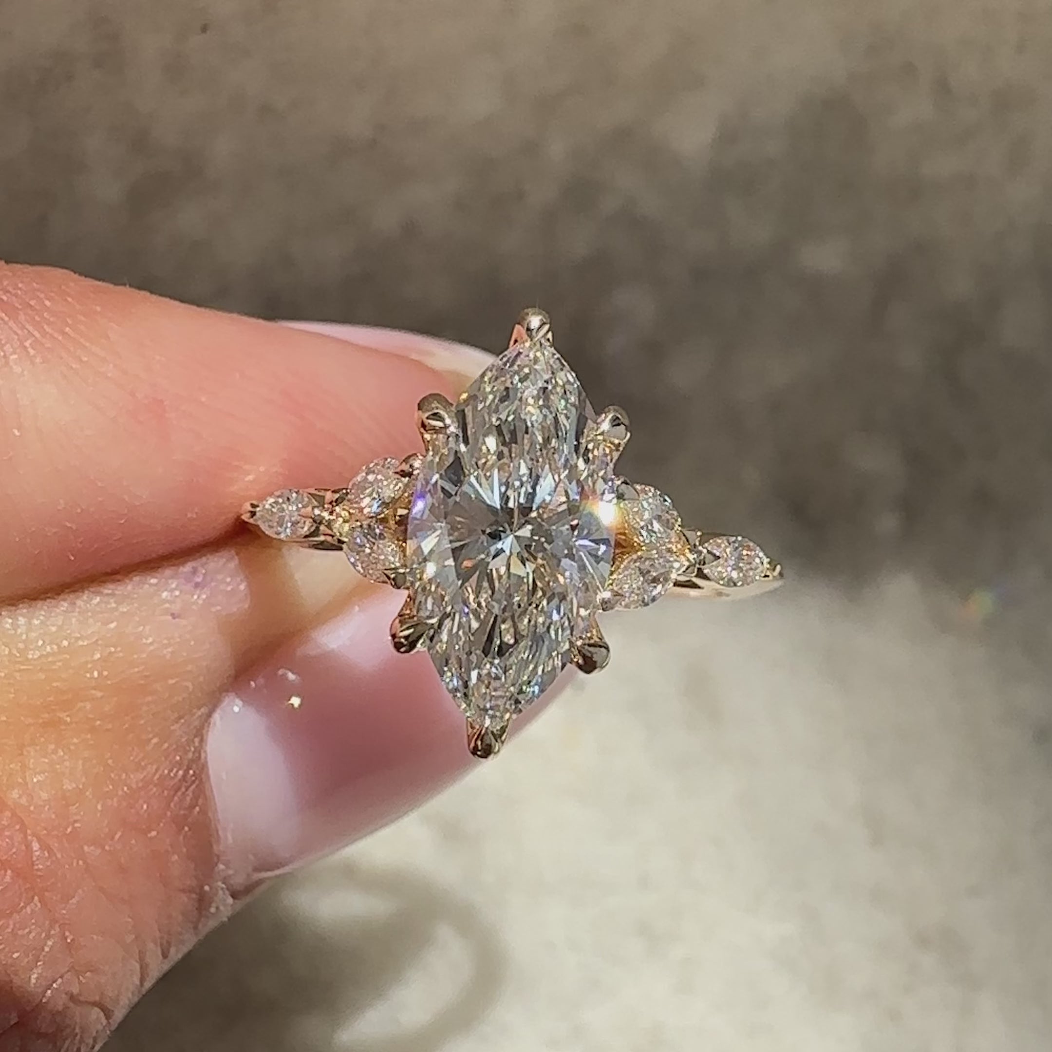 Marquise diamond ring with tulip setting.
