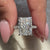 Avideri Engagement Ring with a radiant cut diamond in a 4 prong setting.