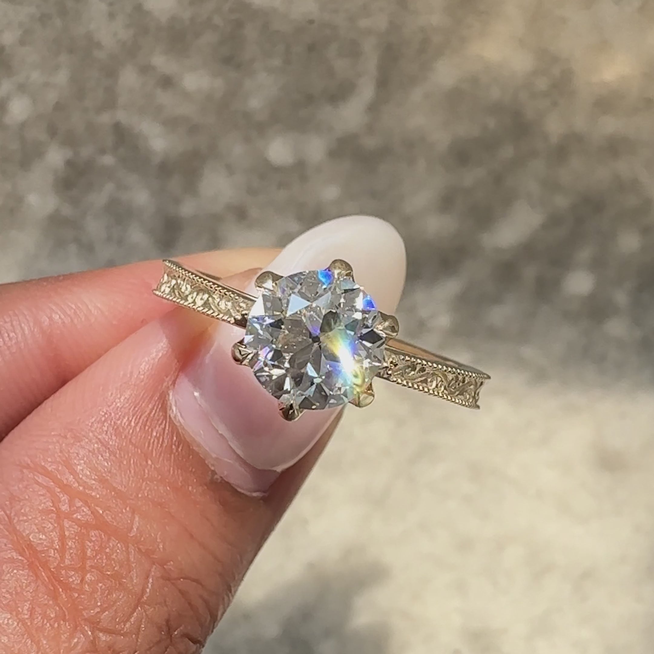 Round old European cut diamond engagement ring.