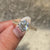 Round old European cut diamond engagement ring.