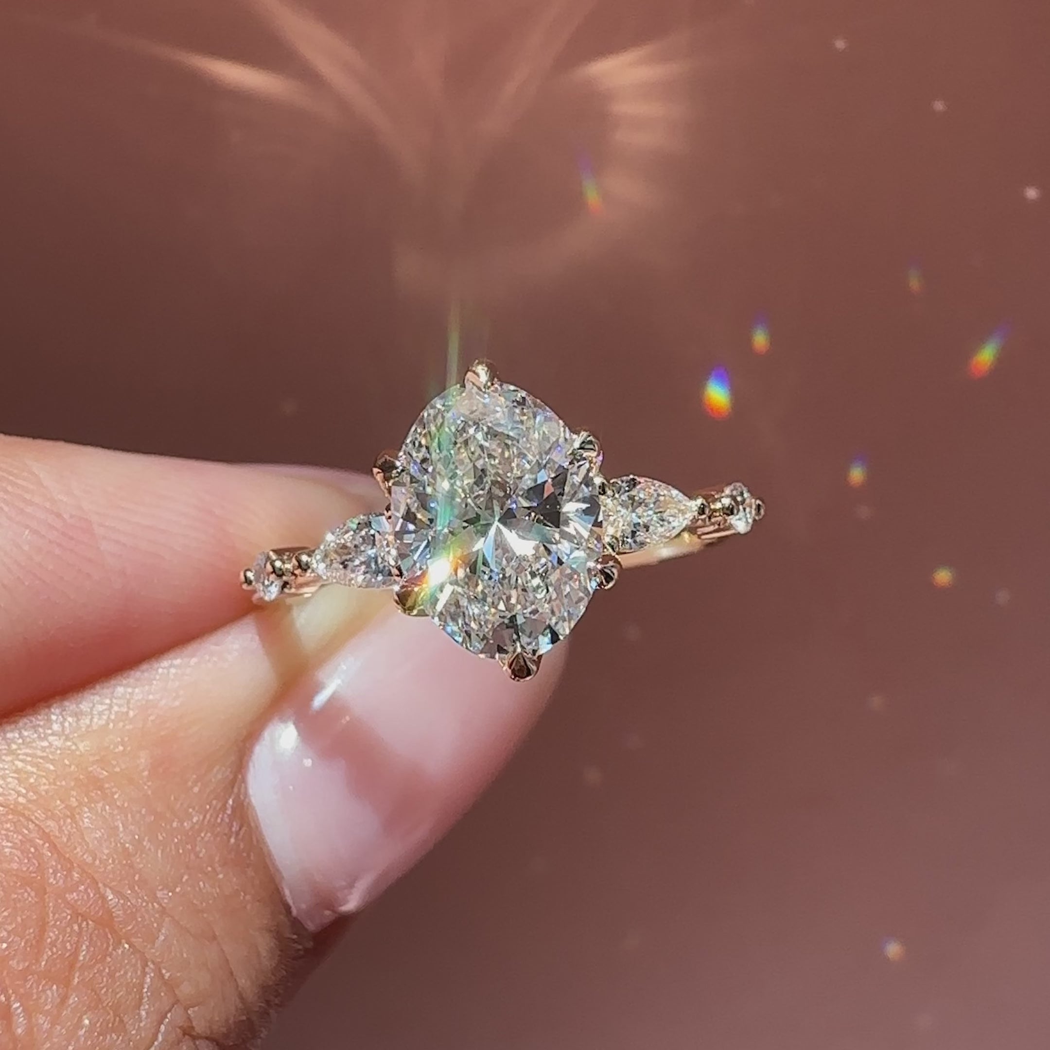 Oval diamond ring with tulip basket setting.
