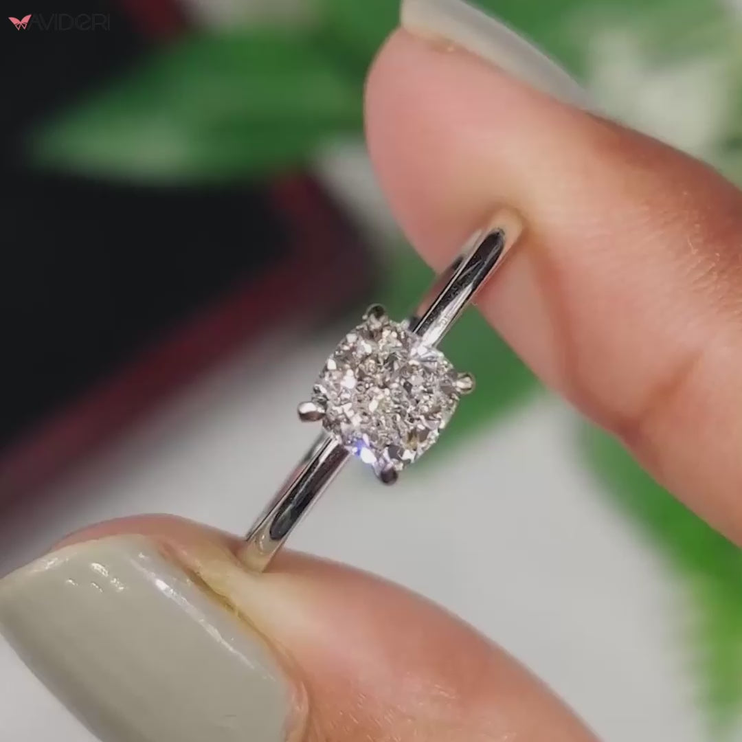 Cushion cut engagement ring featuring a lab grown diamond and solitaire style.