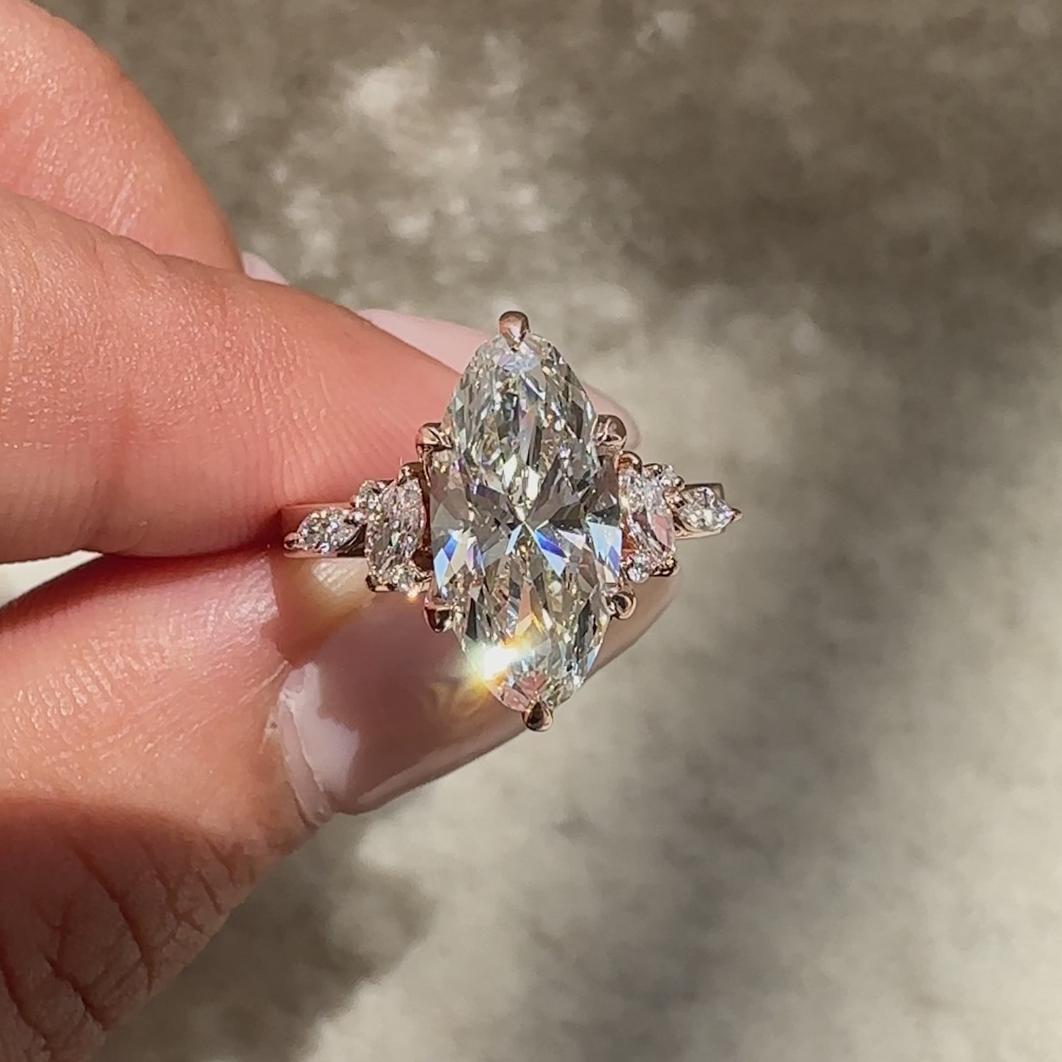 Stylish moval diamond ring with tulip setting.
