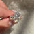 Stylish moval diamond ring with tulip setting.
