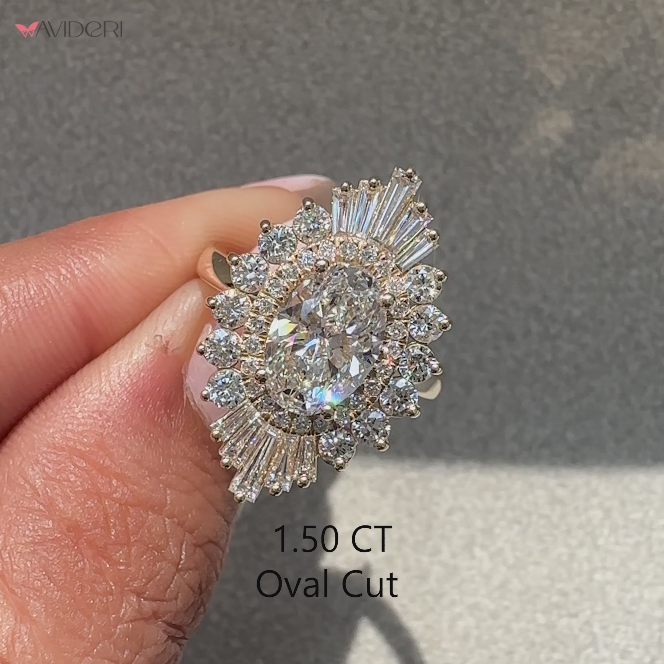 Oval diamond ring with baguette side stones and halo.