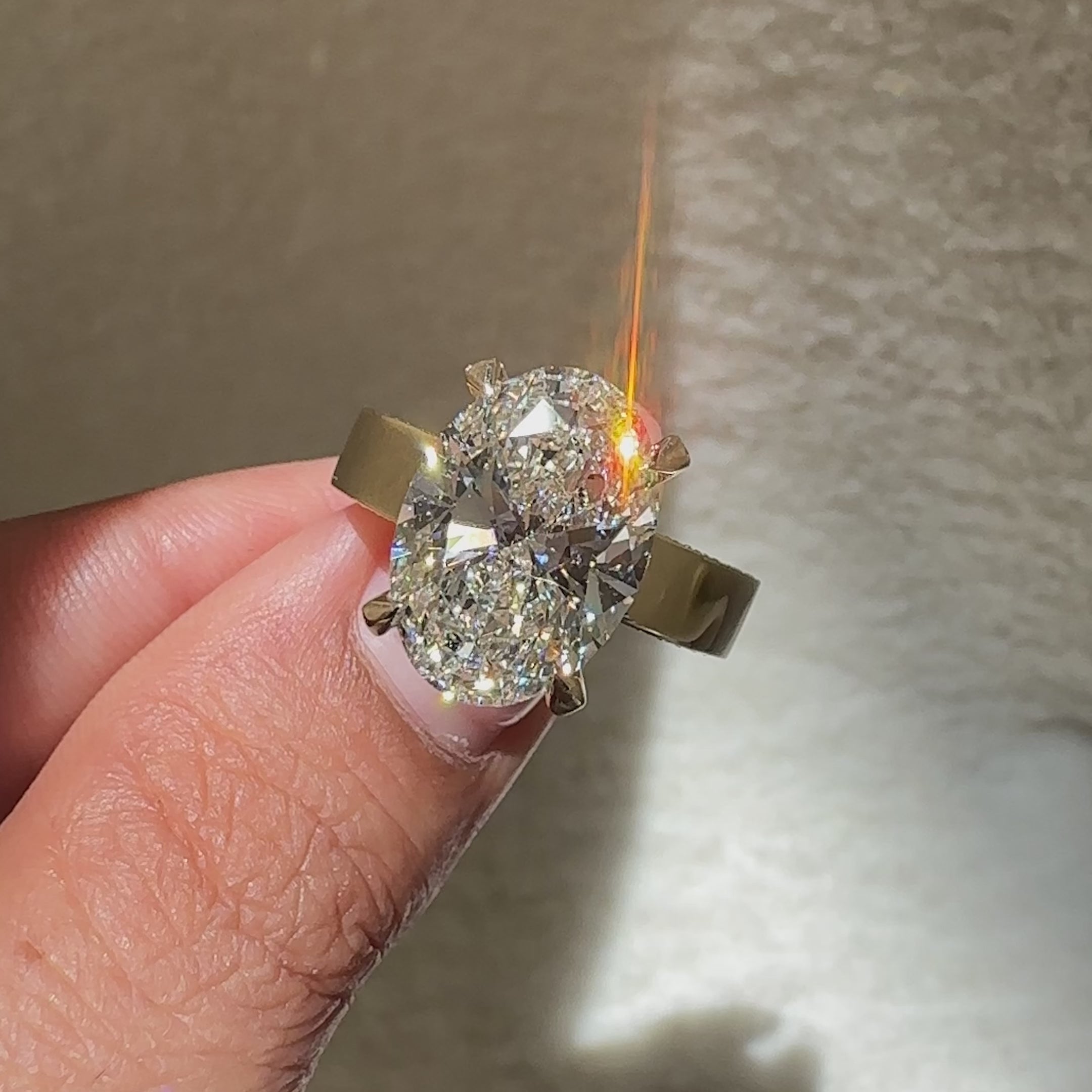 Oval diamond ring available in carat sizes.
