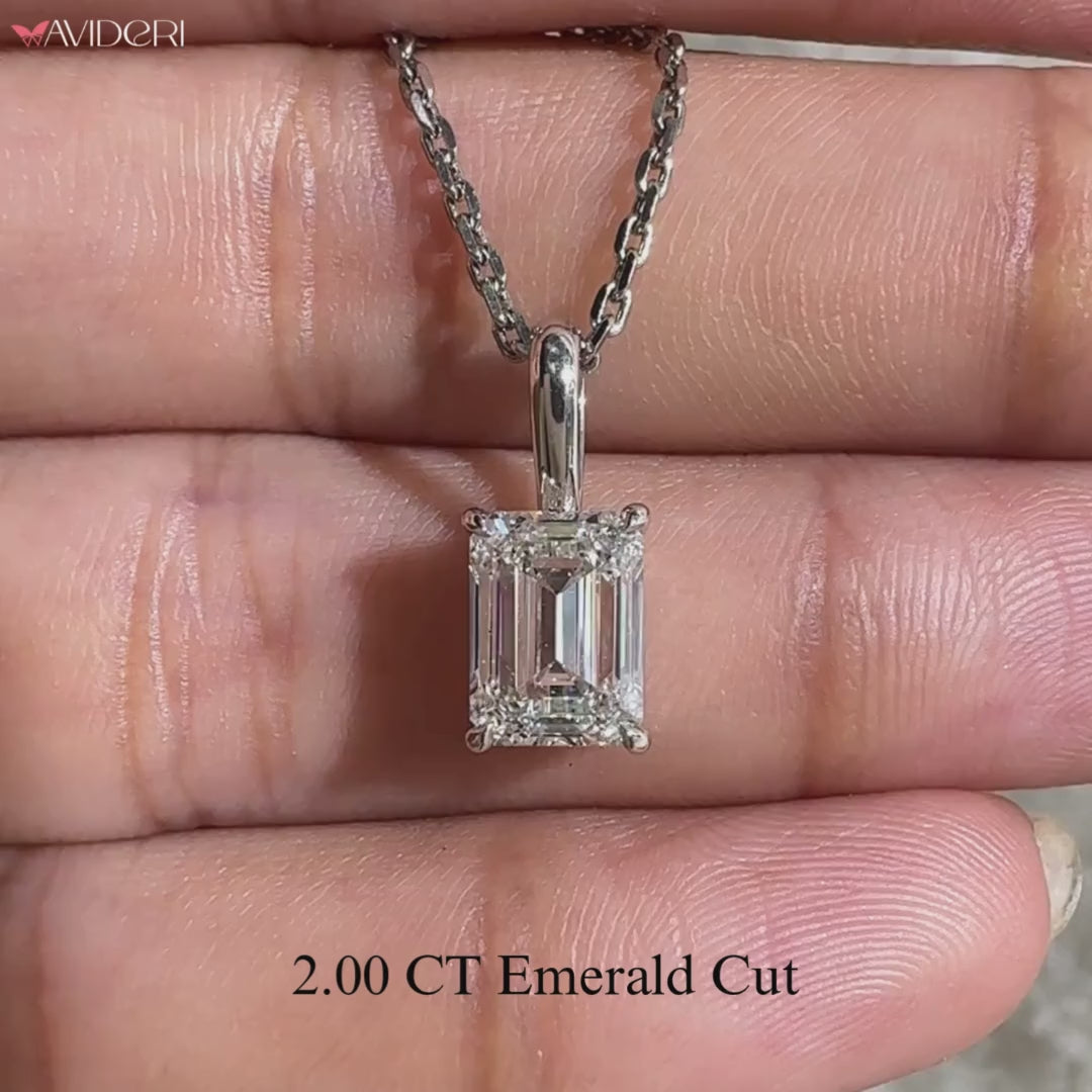 Emerald cut diamond pendant crafted as handmade jewelry.