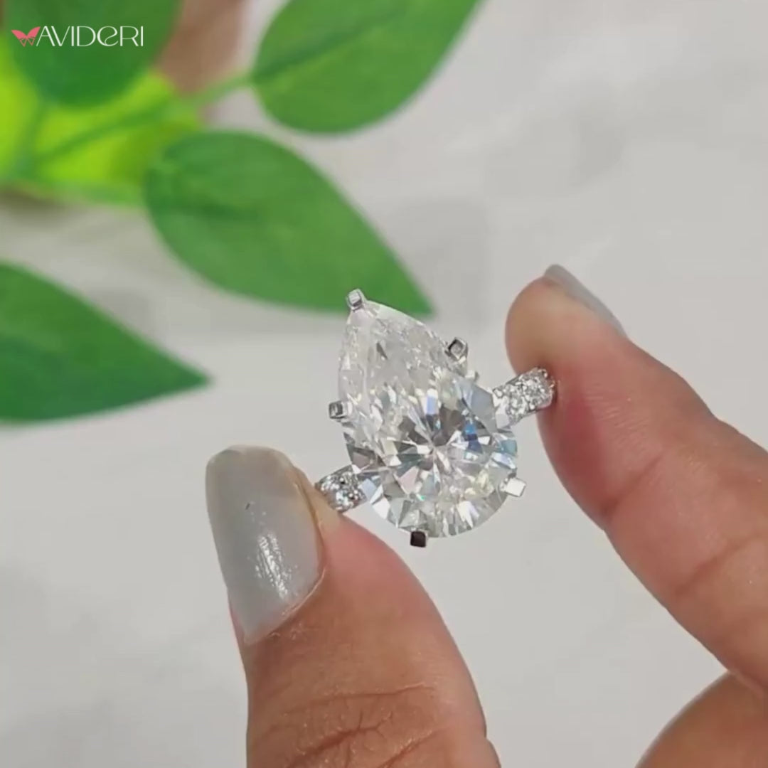 Engagement ring hidden halo design with round cut.
