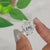 Engagement ring hidden halo design with round cut.
