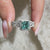 Half eternity wedding band with moissanite bridal set.