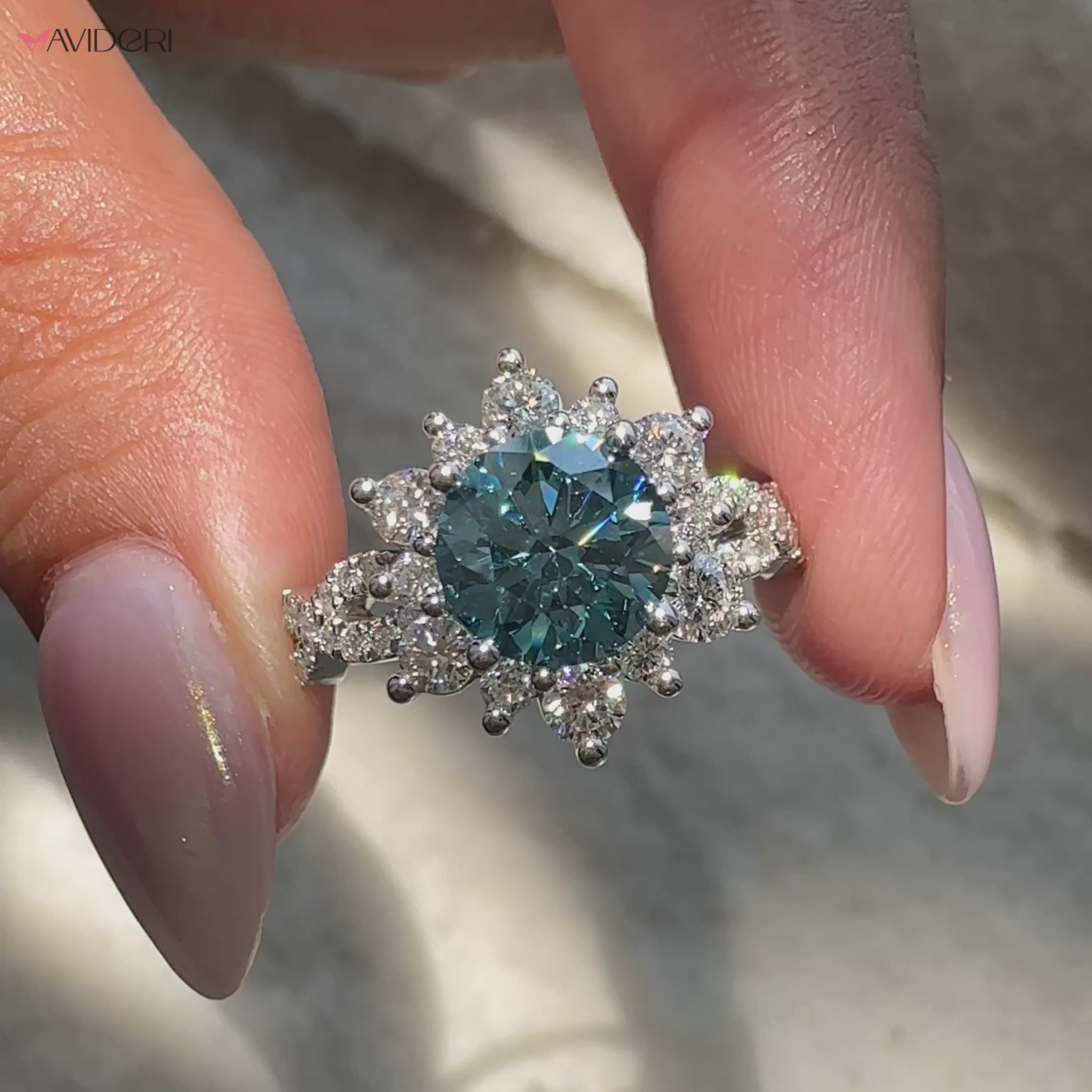 buy handmade engagement ring with round blue diamond and lab grown stones.