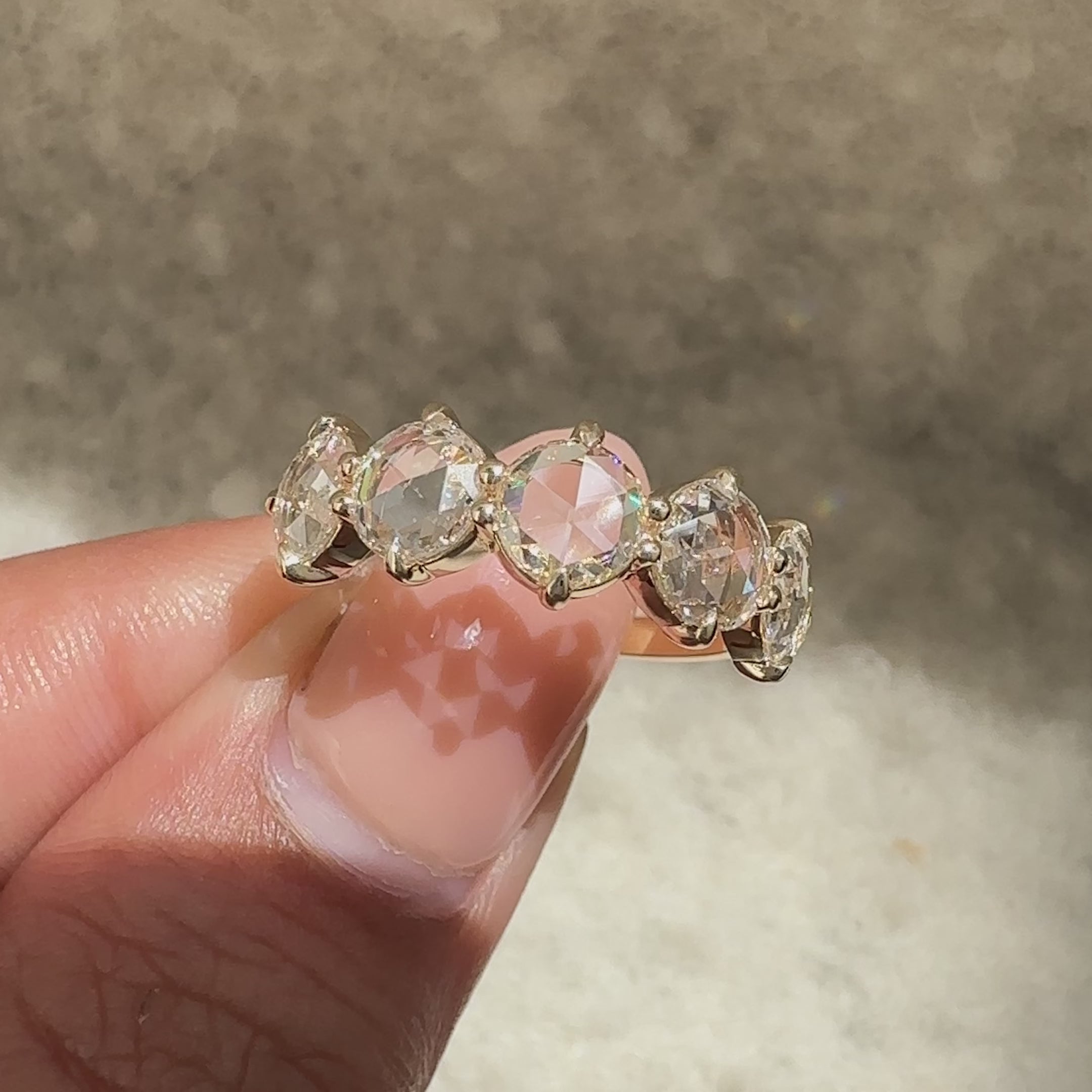 Rose cut diamond band with prong setting.
