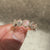 Rose cut diamond band with prong setting.
