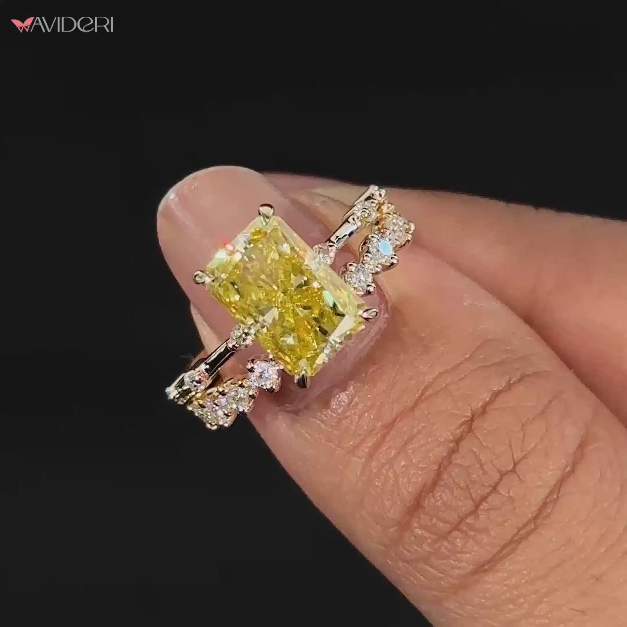 Canary Yellow Radiant Cut Moissanite offers a vibrant and rare touch to your ring.