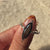 Handmade ring crafted with fine marquise and round stones.