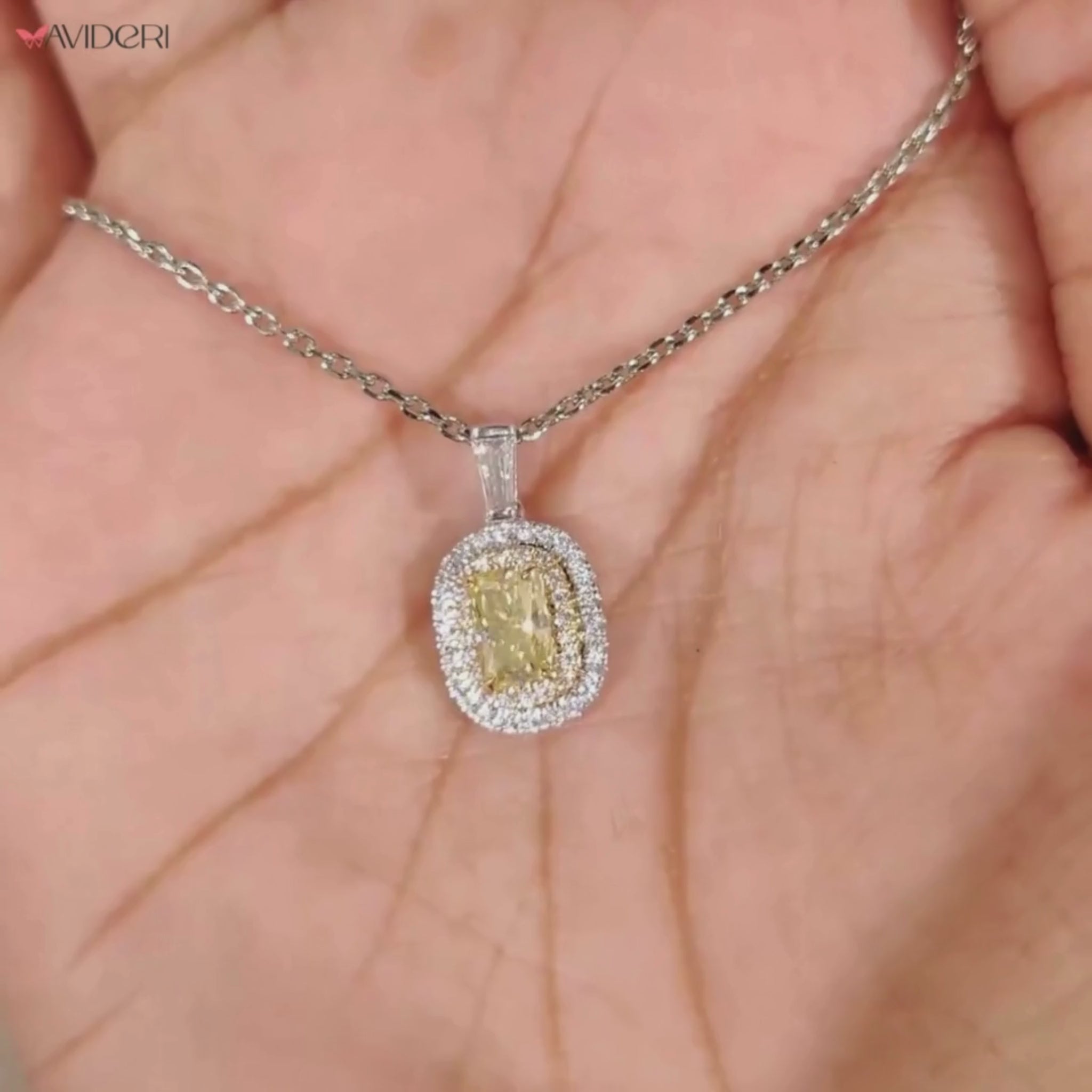 Avideri pendant with radiant cut and double halo charm.