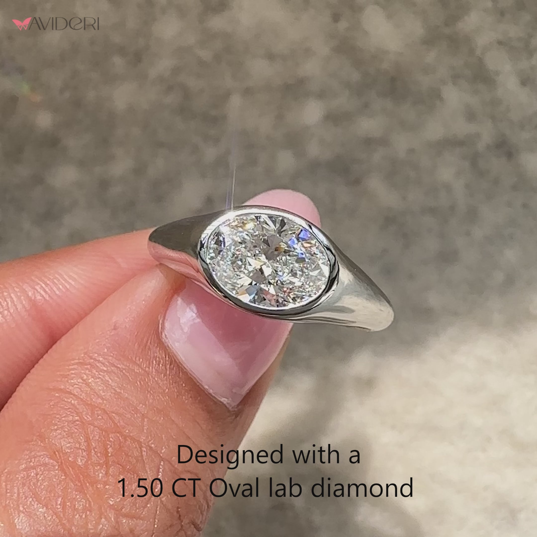 Handmade oval cut diamond ring with clean lines.
