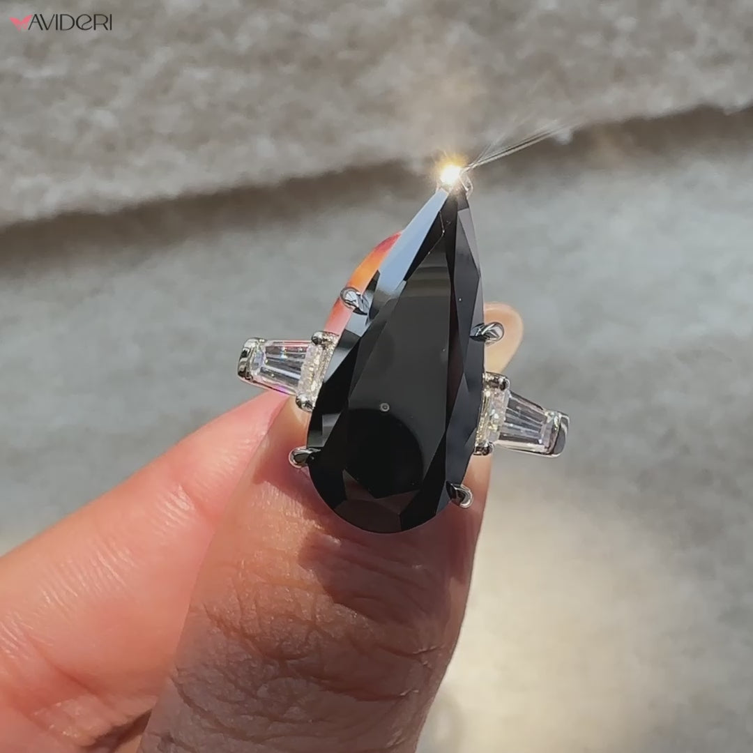 avideri engagement ring with custom elongated pear cut moissanite and prong setting.