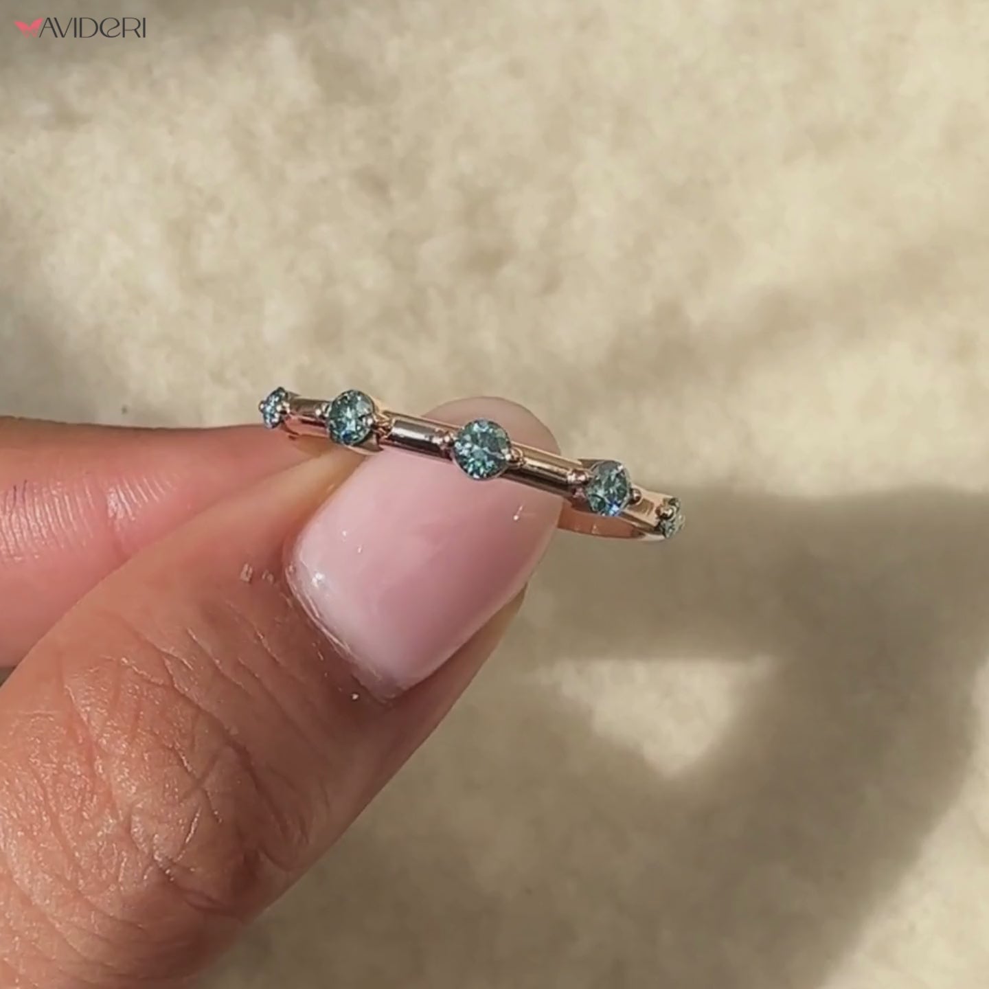 cyan blue round eternity band.