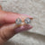 Prong set earrings with handmade diamond detail.