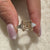 Semi mount ring with unique 3 stone layout.
