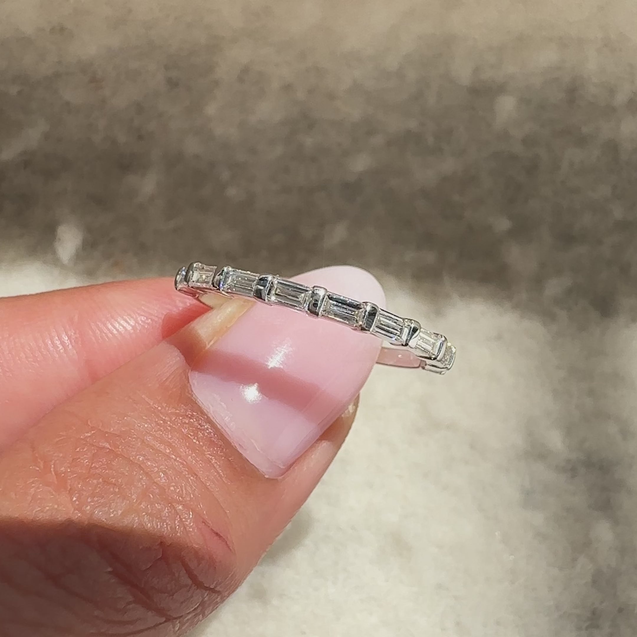 Handmade baguette diamond half eternity band.
