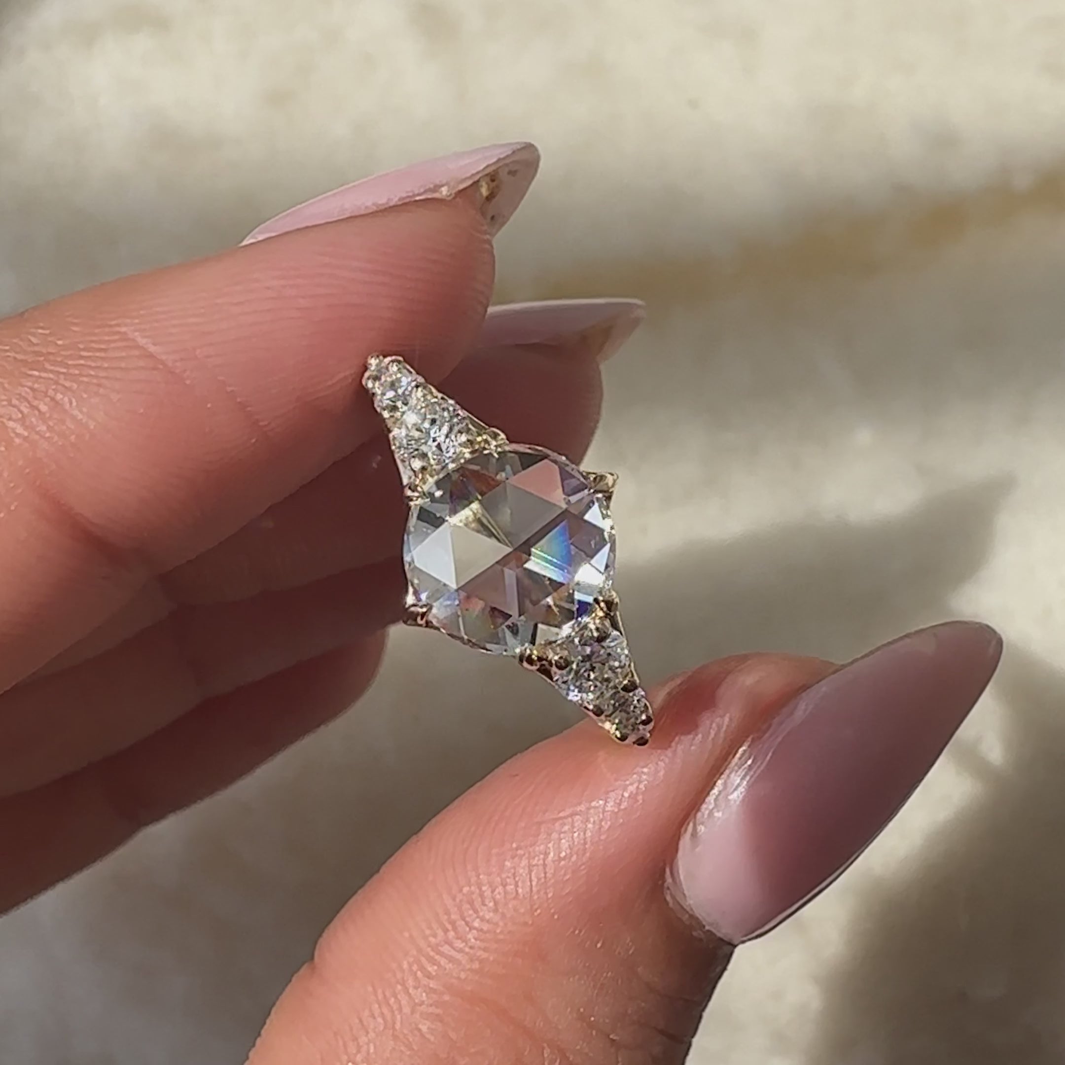 Handmade jewelry in lab-grown diamond ring.