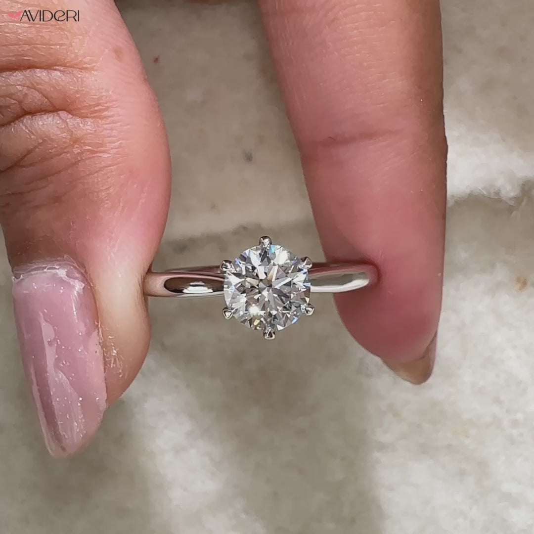 Solitaire diamond ring perfect for anniversary gift.